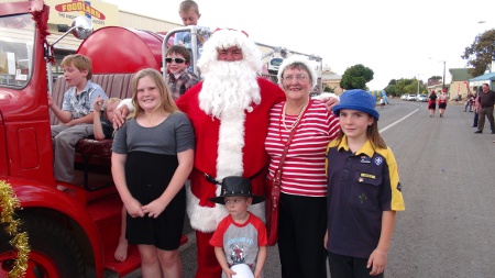 Father Christmas, his helper and kids at the Eudunda Street Parade